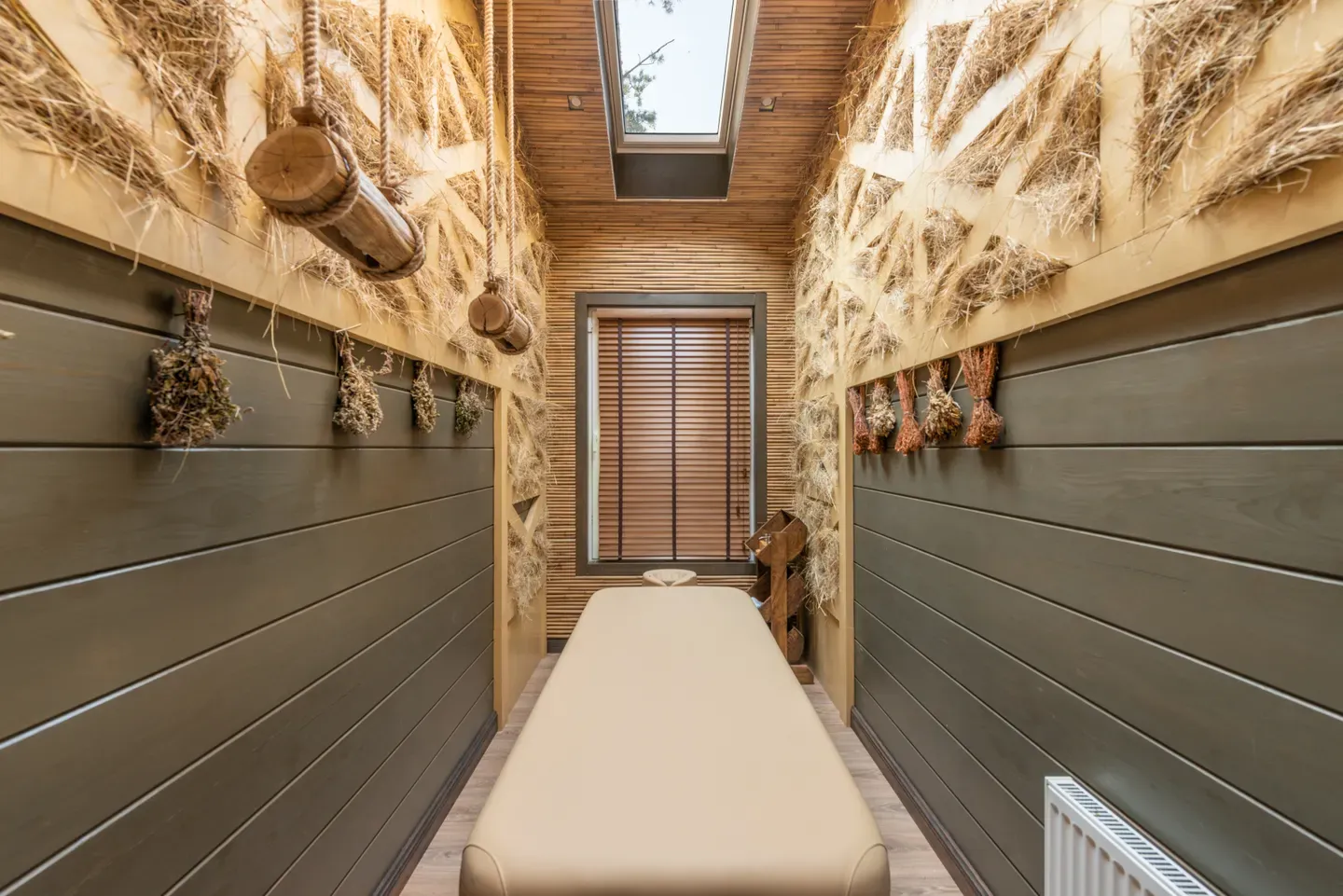 Calm, contemporary massage treatment room